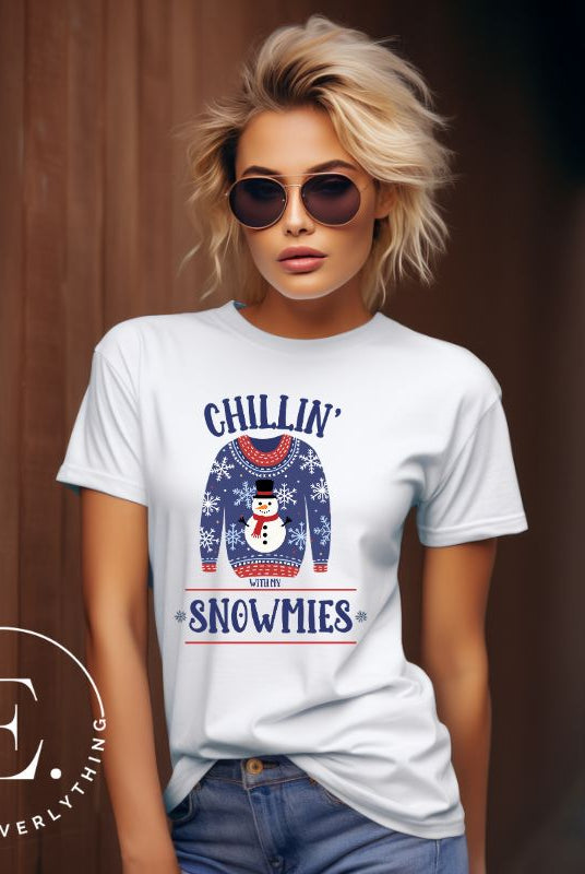 Get into the holiday spirit with our adorable Christmas sweater featuring a snowman and the playful phrase "Chillin' with my Snowmies" on white colored shirt.