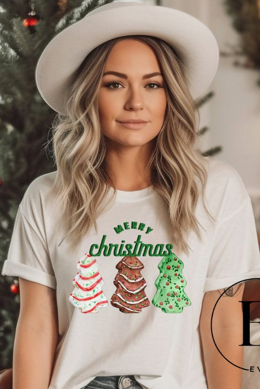 Relive the nostalgia of your childhood with our Christmas shirt that features the beloved classic Christmas tree cookies on a soft cream shirt. 