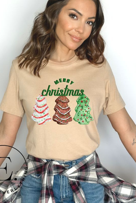 Relive the nostalgia of your childhood with our Christmas shirt that features the beloved classic Christmas tree cookies on a tan shirt. 
