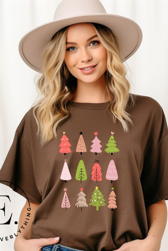 Upgrade your holiday fashion with our contemporary Christmas shirt. The shirt features three rows of multiple different modern Christmas trees in each row, creating a trendy and charming design on a brown shirt. 