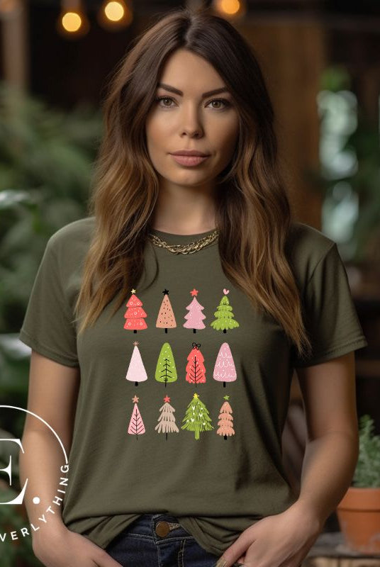 Upgrade your holiday fashion with our contemporary Christmas shirt. The shirt features three rows of multiple different modern Christmas trees in each row, creating a trendy and charming design on an olive colored shirt.