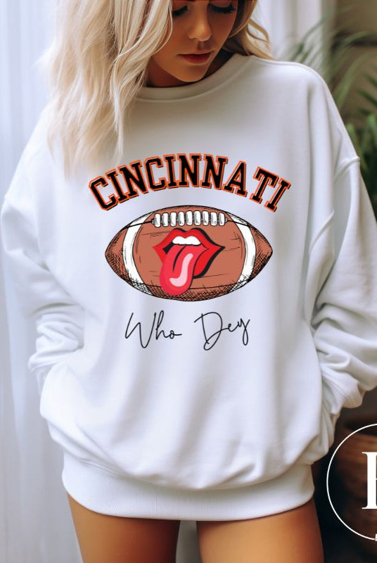 Gear up and show your support for the Cincinnati Bengals with our premium sweatshirt featuring the team's name and rallying slogan, "Who Dey." On a white sweatshirt. 