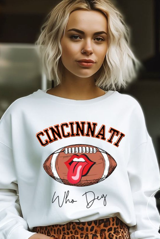 Gear up and show your support for the Cincinnati Bengals with our premium sweatshirt featuring the team's name and rallying slogan, "Who Dey." ON a white sweatshirt. 