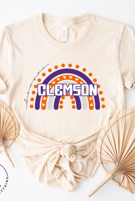 Celebrate your love for Clemson University with our colorful college t-shirt that showcases the beautiful Clemson colors that creates a stunning rainbow backdrop, with the schools name atop a soft cream shirt. 