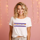 Bella + Canvas 3001 unisex shirt with Clemson University stripe design in purple, orange, and white, with "Clemson" written in bold letters on a white graphic tee.