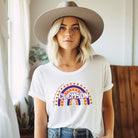 Bella + Canvas 3001 unisex shirt featuring a colorful rainbow design with the word "Clemson" in the center, representing Clemson University on a white graphic tee.