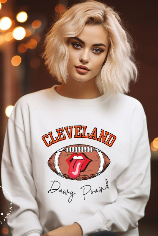 Show your Cleveland Browns pride with our exclusive sweatshirt featuring the team's name and iconic slogan, "Dawg Pound." On a white sweatshirt. 