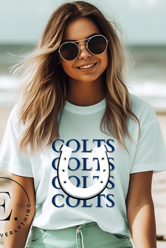 Horseshoe luck meets game day charm! Elevate your Colts pride with our Bella Canvas 3001 unisex tee featuring the spirited mantra "Colts Colts Colts Colts Colts" and a horseshoe illustration on an ice blue shirt. 