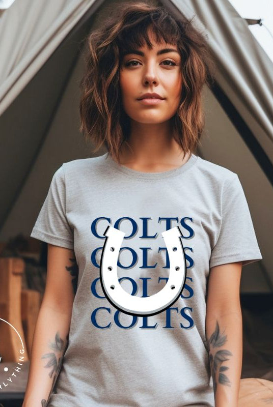 Horseshoe luck meets game day charm! Elevate your Colts pride with our Bella Canvas 3001 unisex tee featuring the spirited mantra "Colts Colts Colts Colts Colts" and a horseshoe illustration on a grey shirt. 