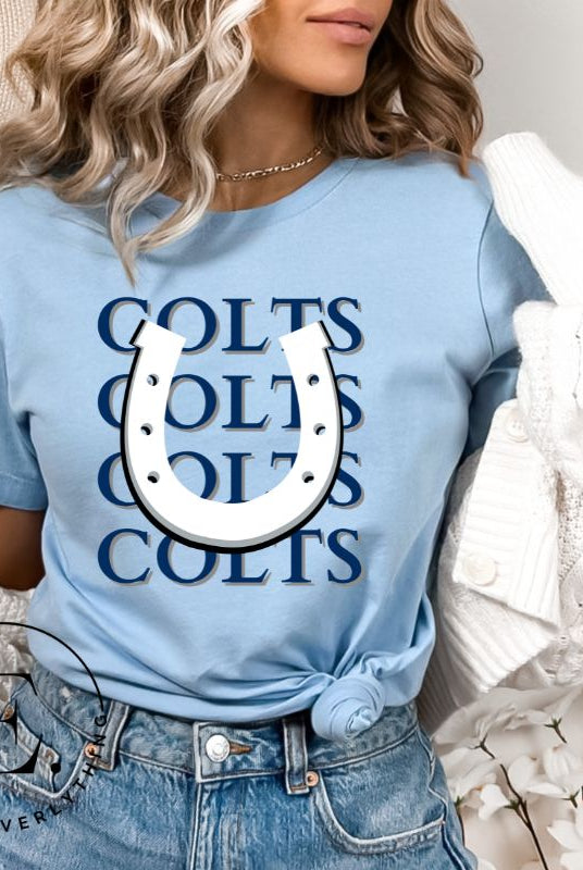 Horseshoe luck meets game day charm! Elevate your Colts pride with our Bella Canvas 3001 unisex tee featuring the spirited mantra "Colts Colts Colts Colts Colts" and a horseshoe illustration on a light blue shirt. 
