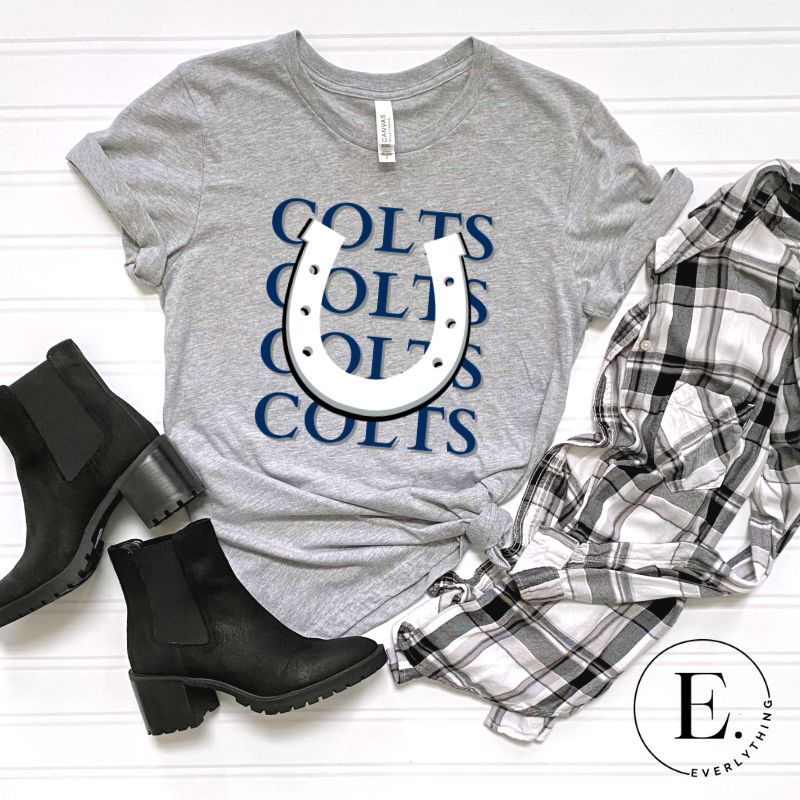 Horseshoe luck meets game day charm! Elevate your Colts pride with our Bella Canvas 3001 unisex tee featuring the spirited mantra "Colts Colts Colts Colts Colts" and a horseshoe illustration on a grey shirt. 