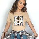 Horseshoe luck meets game day charm! Elevate your Colts pride with our Bella Canvas 3001 unisex tee featuring the spirited mantra "Colts Colts Colts Colts Colts" and a horseshoe illustration on a tan shirt. 