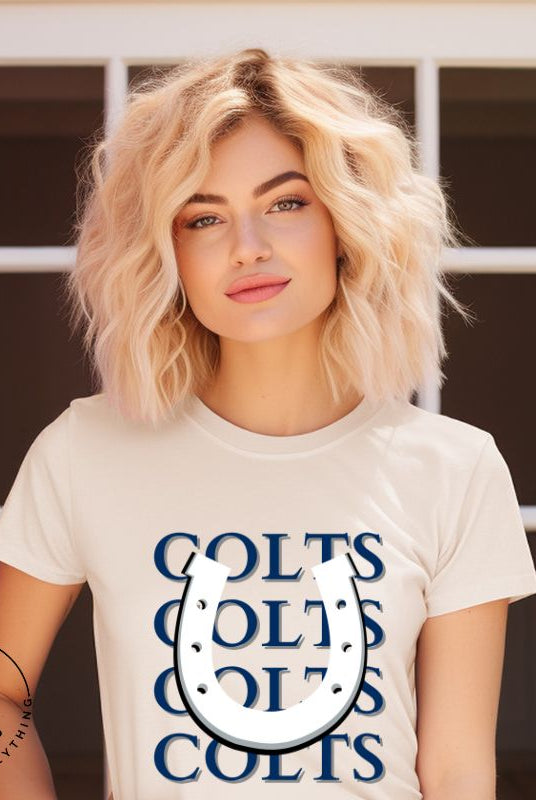 Horseshoe luck meets game day charm! Elevate your Colts pride with our Bella Canvas 3001 unisex tee featuring the spirited mantra "Colts Colts Colts Colts Colts" and a horseshoe illustration on a soft cream shirt. 