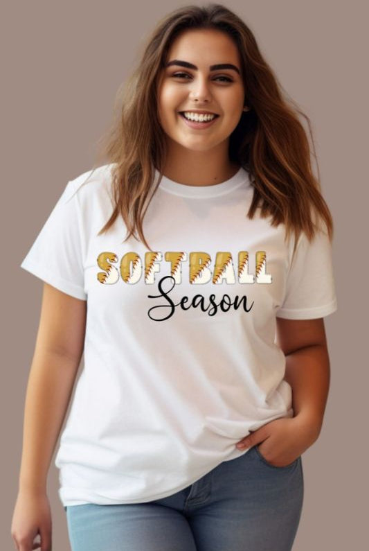 Softball season PNG sublimation digital download design, on a white graphic tee. 