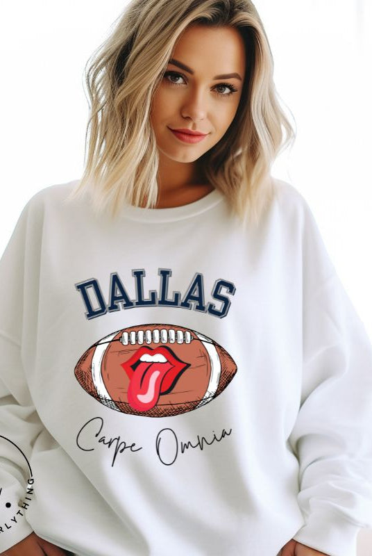 Embrace your Dallas Cowboys pride with our premium sweatshirt showcasing the team's name and empowering slogan, "Crape Omnia." On a white sweatshirt. 