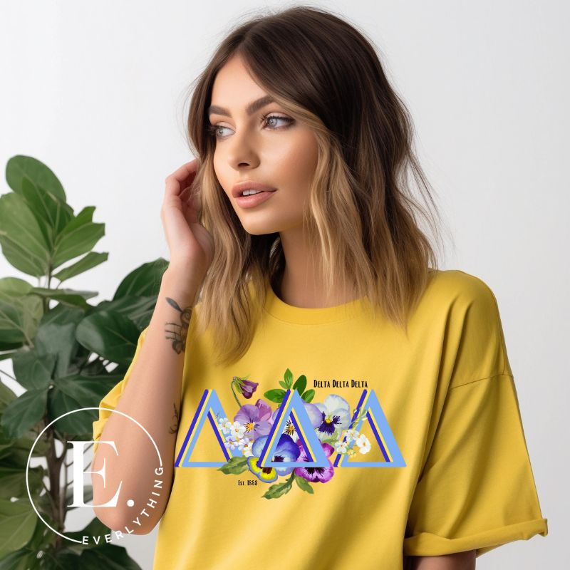 Flaunt your Delta Delta Delta sisterhood with our downloadable PNG sublimation t-shirt design! Featuring the sorority letters and the beautiful pansy on yellow shirt. 