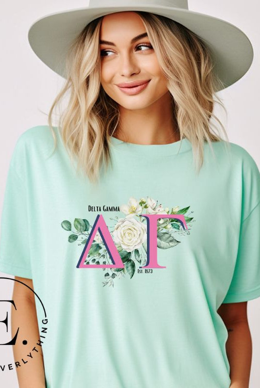 Display your Delta Gamma pride with our downloadable PNG Sublimation t-shirt design! Featuring the sorority letters and the exquisite cream-colored rose on a mint shirt. 