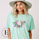 Display your Delta Gamma pride with our downloadable PNG Sublimation t-shirt design! Featuring the sorority letters and the exquisite cream-colored rose on a mint shirt. 