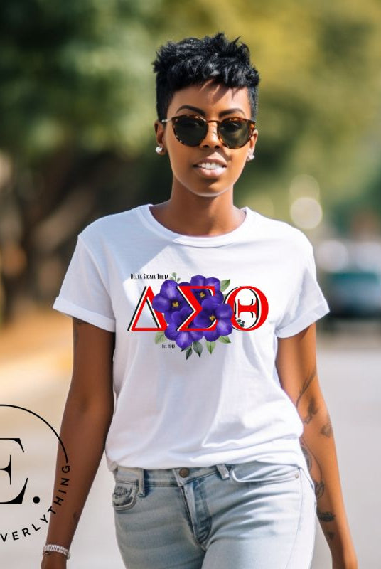 Show off your Delta Sigma Theta sisterhood with our exclusive sorority t-shirt design! The t-shirt features the sorority's letters along with the vibrant African violet, symbolizing empowerment, strength, and courage on a white shirt. 