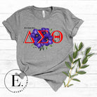 Show off your Delta Sigma Theta sisterhood with our exclusive sorority t-shirt design! The t-shirt features the sorority's letters along with the vibrant African violet, symbolizing empowerment, strength, and courage on a grey shirt. 