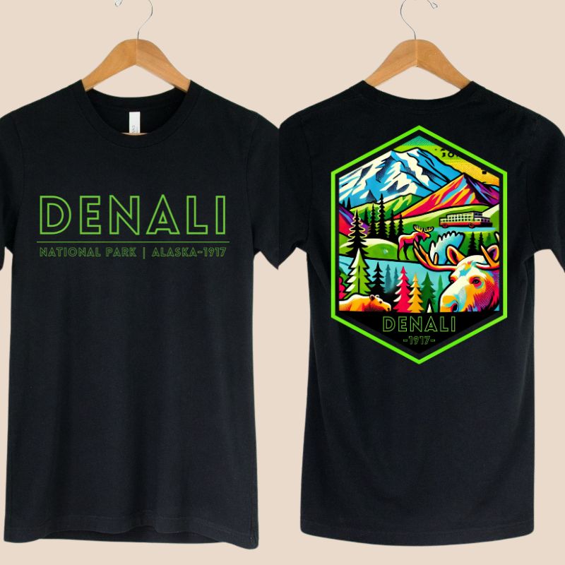 Black Bella + Canvas 3001 t-shirt with front and back Denali National Park designs. The front features "Denali National Park | Alaska - 1917" in neon green text, and the back showcases a colorful, detailed illustration of Denali's landscapes and wildlife.