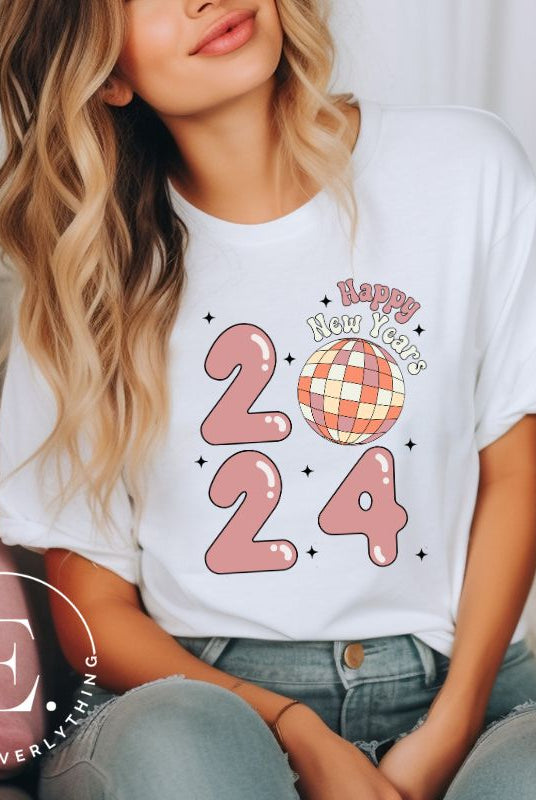 Step into the new year in dazzling style with our 'Happy New Year 2024' shirt. Featuring a shimmering disco ball as the '0' this eye catching design exudes festivity and fun on a white shirt. 