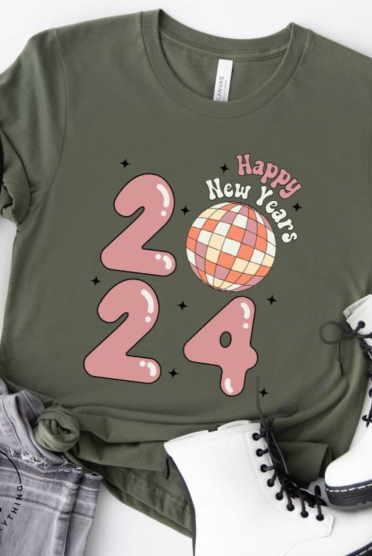 Step into the new year in dazzling style with our 'Happy New Year 2024' shirt. Featuring a shimmering disco ball as the '0' this eye catching design exudes festivity and fun on a green shirt. 