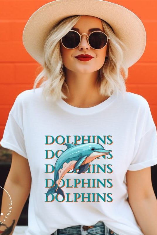 Introducing the Bella Canvas 3001 unisex graphic t-shirt that will make a splash! Dive into style with our Dolphins Dolphins Dolphins Dolphins tee, featuring a playful illustration of a dolphin for the Miami Dolphins football team on a white shirt. 