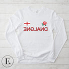 Introducing our England Rugby Backwards Letter Graphic Long Sleeve Shirt - a unique and bold representation of your love for English rugby! This long sleeve shirt features the word "England" spelled with backwards letters, creating an eye-catching and distinctive design that is sure to turn heads on a white shirt. 