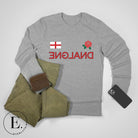 Introducing our England Rugby Backwards Letter Graphic Long Sleeve Shirt - a unique and bold representation of your love for English rugby! This long sleeve shirt features the word "England" spelled with backwards letters, creating an eye-catching and distinctive design that is sure to turn heads on a grey shirt. 