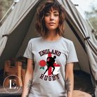 Introducing our England Rugby Graphic T-Shirt - the ultimate fusion of patriotism, rugby pride, and contemporary style! This captivating t-shirt features the words "England Rugby" and the iconic England flag artfully incorporated within the outline of the country, accompanied by a dynamic rugby player graphic on a grey shirt. 