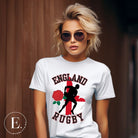 Introducing our England Rugby Graphic T-Shirt - the ultimate fusion of patriotism, rugby pride, and contemporary style! This captivating t-shirt features the words "England Rugby" and the iconic England flag artfully incorporated within the outline of the country, accompanied by a dynamic rugby player graphic on a white shirt. 