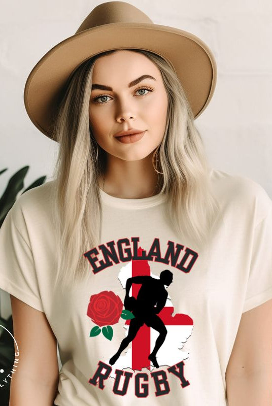 Introducing our England Rugby Graphic T-Shirt - the ultimate fusion of patriotism, rugby pride, and contemporary style! This captivating t-shirt features the words "England Rugby" and the iconic England flag artfully incorporated within the outline of the country, accompanied by a dynamic rugby player graphic on a soft cream shirt. 