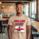 Introducing our England Rugby Graphic T-Shirt - a dynamic and spirited way to showcase your unwavering support for the English rugby team! This captivating t-shirt features the words "England Rugby" and the iconic England flag, with the powerful statement "We are England" proudly displayed beneath the flag on a sand shirt. 