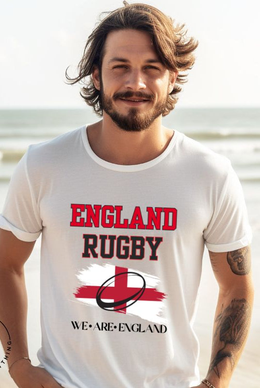 Introducing our England Rugby Graphic T-Shirt - a dynamic and spirited way to showcase your unwavering support for the English rugby team! This captivating t-shirt features the words "England Rugby" and the iconic England flag, with the powerful statement "We are England" proudly displayed beneath the flag on a white shirt. 