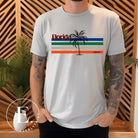 Celebrate your love for the Florida Gators with our modern-inspired retro t-shirt. It captures the essence of campus life, featuring school colors in lines and a palm tree motif on a grey shirt. 