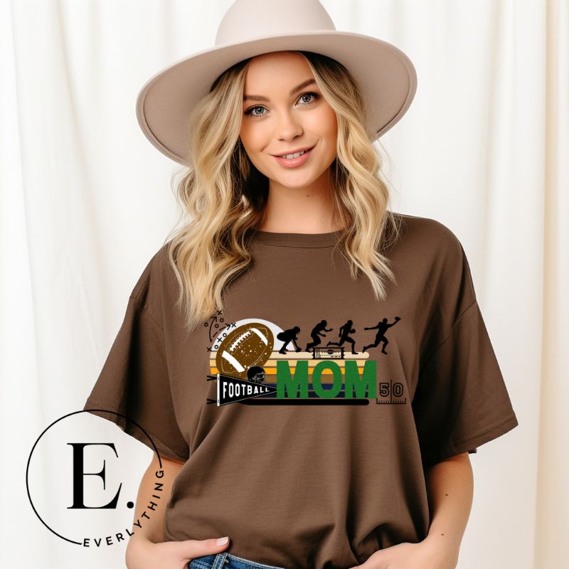 Show off your team spirit with our PNG sublimation download for a football mom shirt. Create a personalized and stylish shirt that proudly represents your role as a dedicated football mom. Perfect for game days or everyday wear. PNG on a brown shirt. 