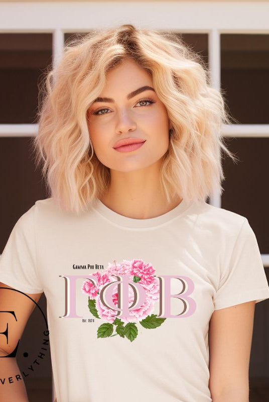 Are you looking for a way to show off your Gamma Phi Beta pride? Look no further than our sorority t-shirt design! Our shirts feature the sorority letters and a beautiful pink carnation, representing the values of sisterhood and beauty that Gamma Phi Beta stands for on a soft cream shirt. 