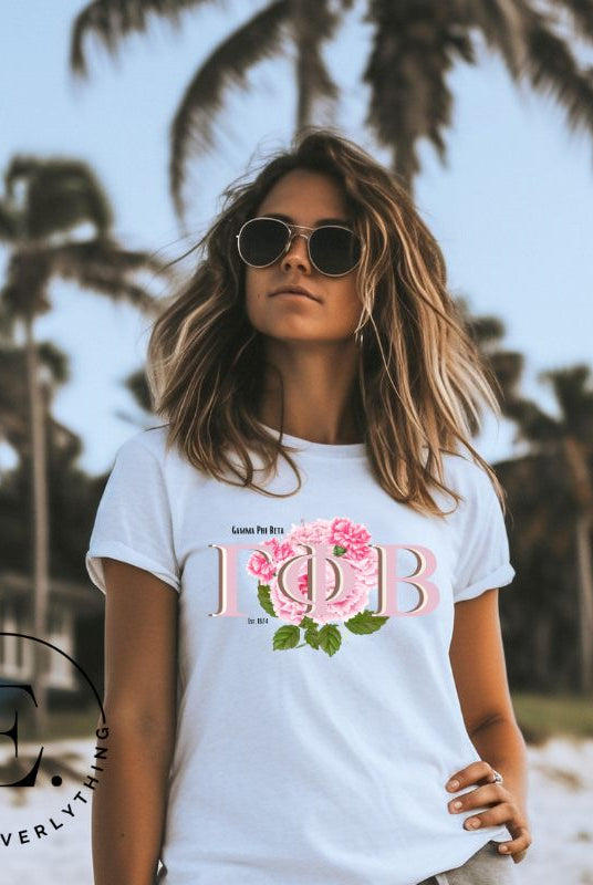 Are you looking for a way to show off your Gamma Phi Beta pride? Look no further than our sorority t-shirt design! Our shirts feature the sorority letters and a beautiful pink carnation, representing the values of sisterhood and beauty that Gamma Phi Beta stands for on a white shirt