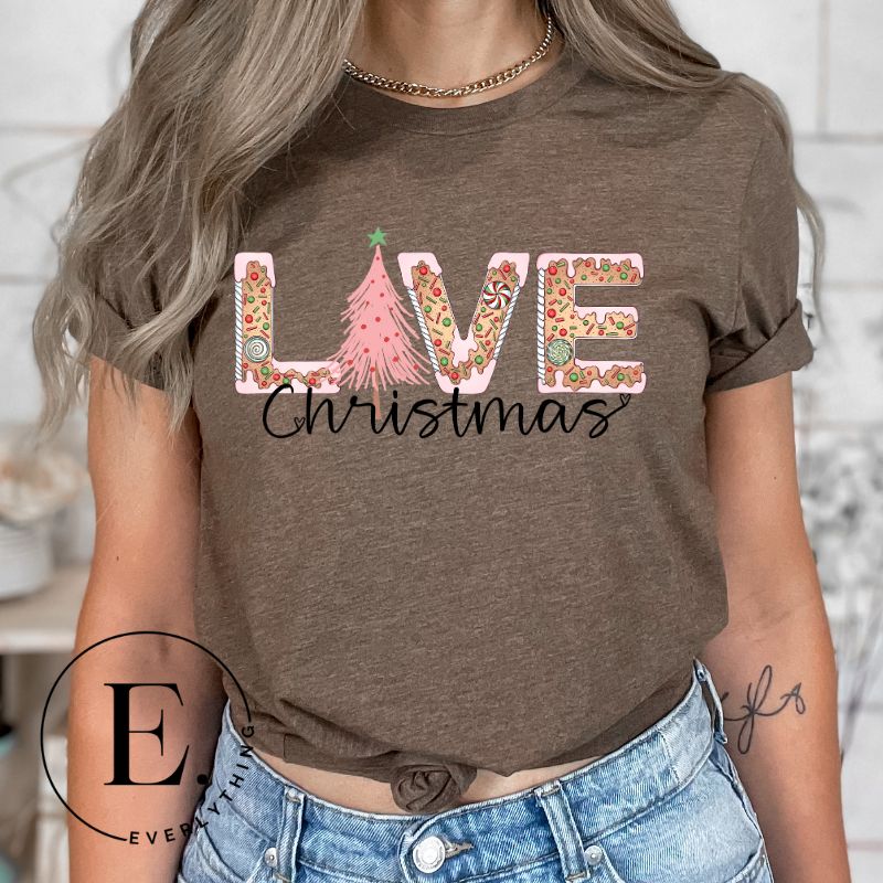 Add a touch of whimsy to your holiday wardrobe with our downloadable Christmas PNG sublimation t-shirt design! The word 'love' is spelled out in adorable gingerbread letters, evoking the warmth and sweetness of Christmas season on a brown shirt. 