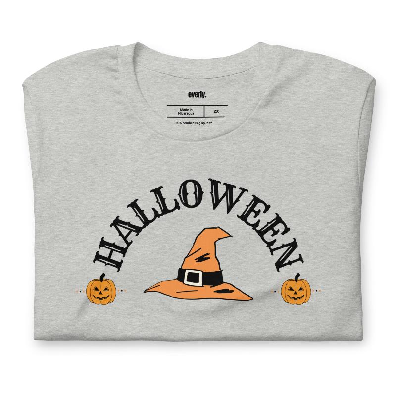 Grey t-shirt with a simple Halloween design featuring a witch hat and pumpkins, perfect for spooky season celebrations.