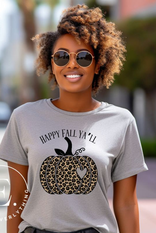 Get ready for fall with our adorable cheetah pumpkin shirt. Featuring a charming design of a cheetah pumpkin with a heart, it's the perfect blend of style and seasonal spirit. Spread the autumn cheer with the saying 'Happy Fall Ya'll' and embrace the coziness of the season on a grey shirt. 