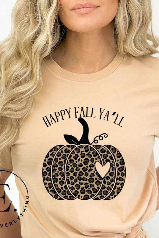 Get ready for fall with our adorable cheetah pumpkin shirt. Featuring a charming design of a cheetah pumpkin with a heart, it's the perfect blend of style and seasonal spirit. Spread the autumn cheer with the saying 'Happy Fall Ya'll' and embrace the coziness of the season on a tan shirt. 