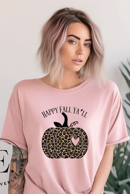 Get ready for fall with our adorable cheetah pumpkin shirt. Featuring a charming design of a cheetah pumpkin with a heart, it's the perfect blend of style and seasonal spirit. Spread the autumn cheer with the saying 'Happy Fall Ya'll' and embrace the coziness of the season on a pink shirt. 