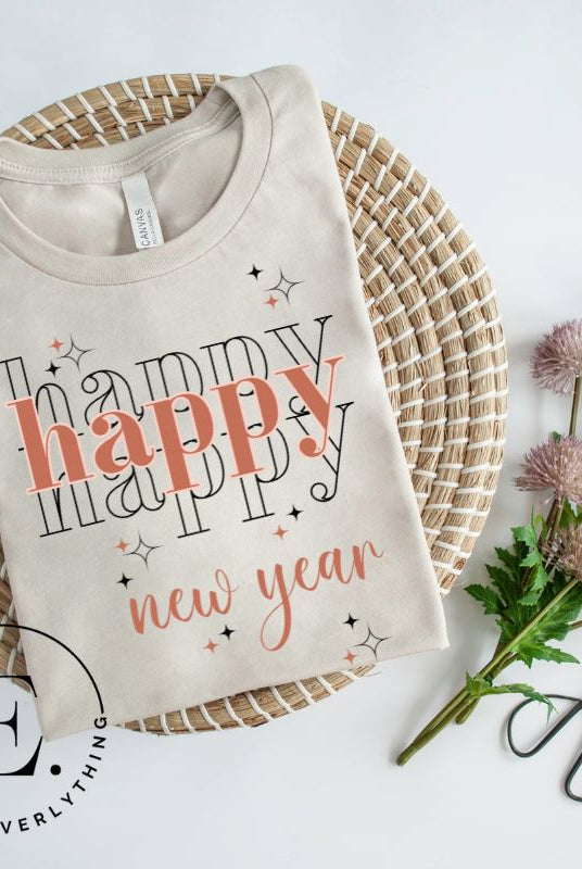 Celebrate in style with our 'Happy Happy Happy New Year' shirt. Embrace the joy of the season with this vibrant design, perfect for ringing in the new year. Crafted with comfort in mind and bursting with festive cheer, on a soft cream shirt. 