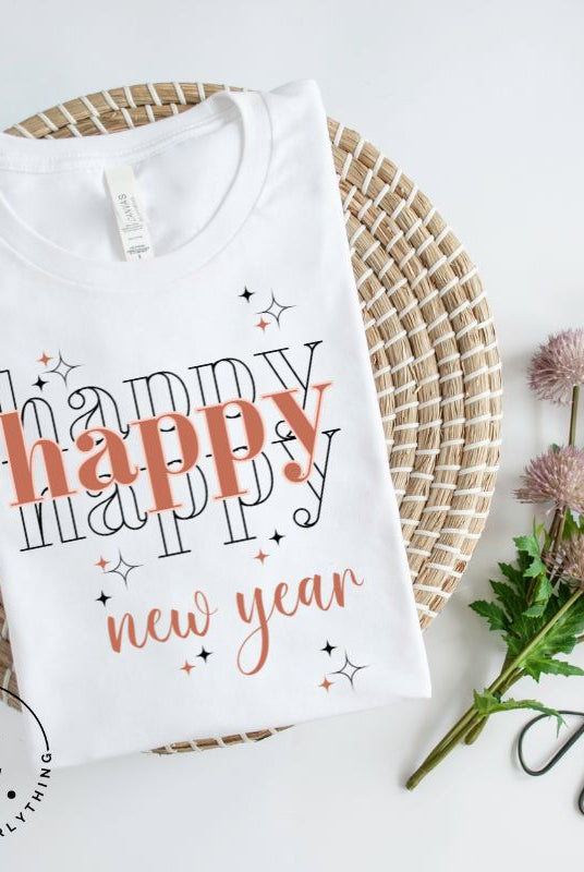 Celebrate in style with our 'Happy Happy Happy New Year' shirt. Embrace the joy of the season with this vibrant design, perfect for ringing in the new year. Crafted with comfort in mind and bursting with festive cheer, on a white shirt. 