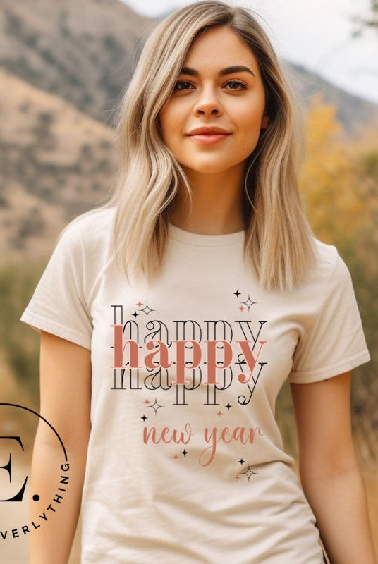 Celebrate in style with our 'Happy Happy Happy New Year' shirt. Embrace the joy of the season with this vibrant design, perfect for ringing in the new year. Crafted with comfort in mind and bursting with festive cheer, on a cream shirt. 