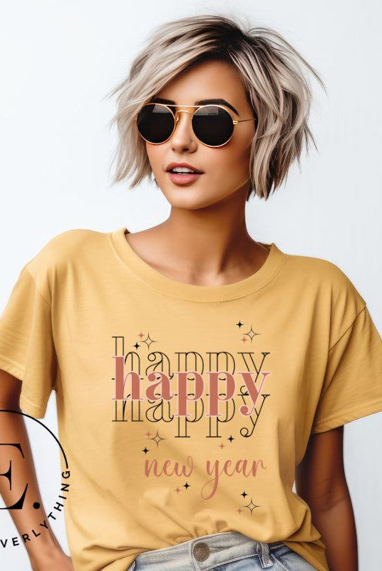 Celebrate in style with our 'Happy Happy Happy New Year' shirt. Embrace the joy of the season with this vibrant design, perfect for ringing in the new year. Crafted with comfort in mind and bursting with festive cheer, on a yellow shirt. 