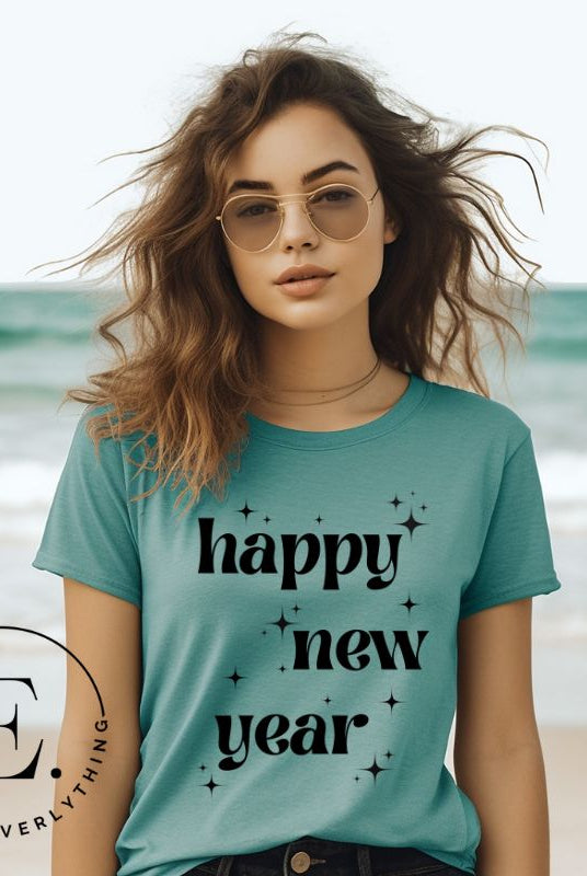 Ring in the New Year with our stunning Happy New Year shirt featuring captivating modern star designs on a teal shirt. 