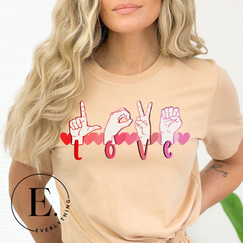 Express love in a visually stunning way with our downloadable PNG sublimation t-shirt design! Featuring American Sign Language (ASL) hands spelling 'Love' with hearts running through them on a tan shirt. 